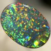 SOLID BLACK OPAL Huge 41 carats, top quality showing a Flag Harlequin pattern with a touch of Hexagonal. SEE VIDEO